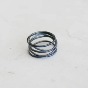 Oxidized silver is a popular choice in jewelry, known for its bold, antique-like look. Whether you’re eyeing a cluster necklace or a statement ring, understanding oxidized silver can help you appreciate its charm. This blog post breaks down what oxidized silver is, how it’s made, its uses in cluster jewelry, and how to care for it